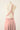 Robe Prestance rose pastel — dos 2 torsade